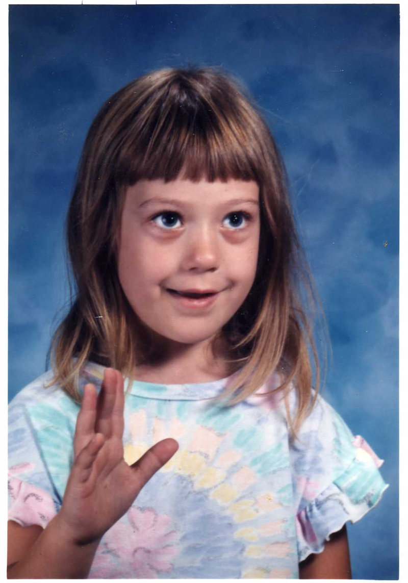 Illustration for article titled Goofy Glasses, Pretty Pigtails & Snaggletooth Smiles: September Is For School Portraits
